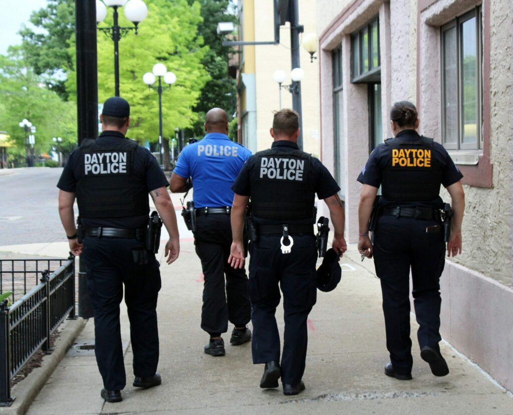 Photo of police officers walking away from the camera