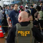 As wait times soar, Trump mulls deploying National Guard to airports