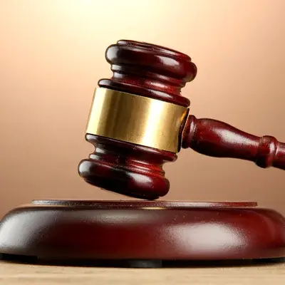 depositphotos_13485211-stock-photo-wooden-gavel-on-wooden-table